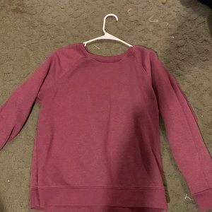 I bought this at Walmart and is a purple crew neck.